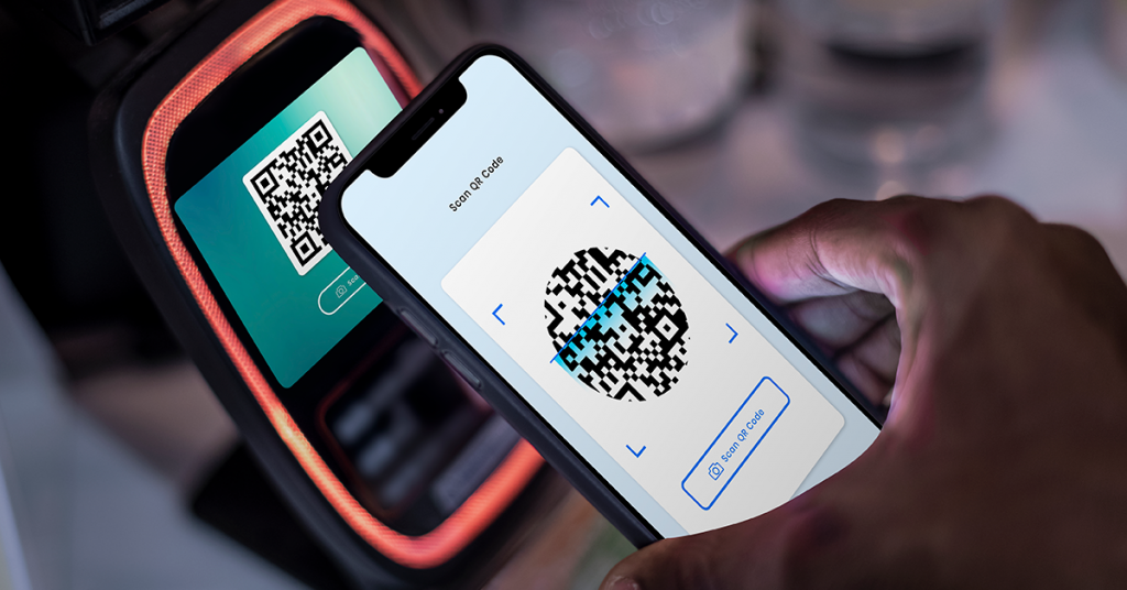 scanning QR code using mobile phone - digital society